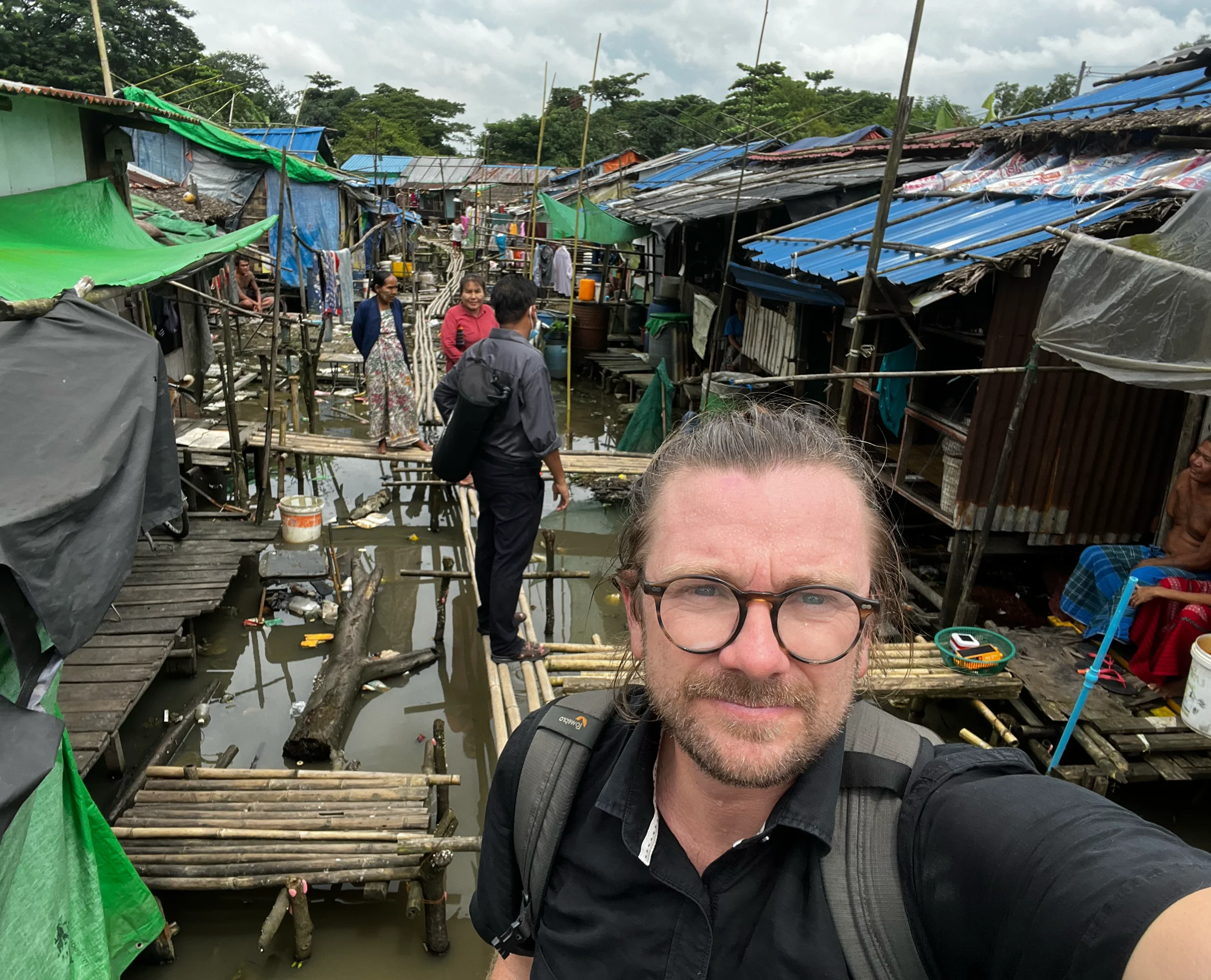 Armin im Slum Myanmar Reise Bericht SONNE-International